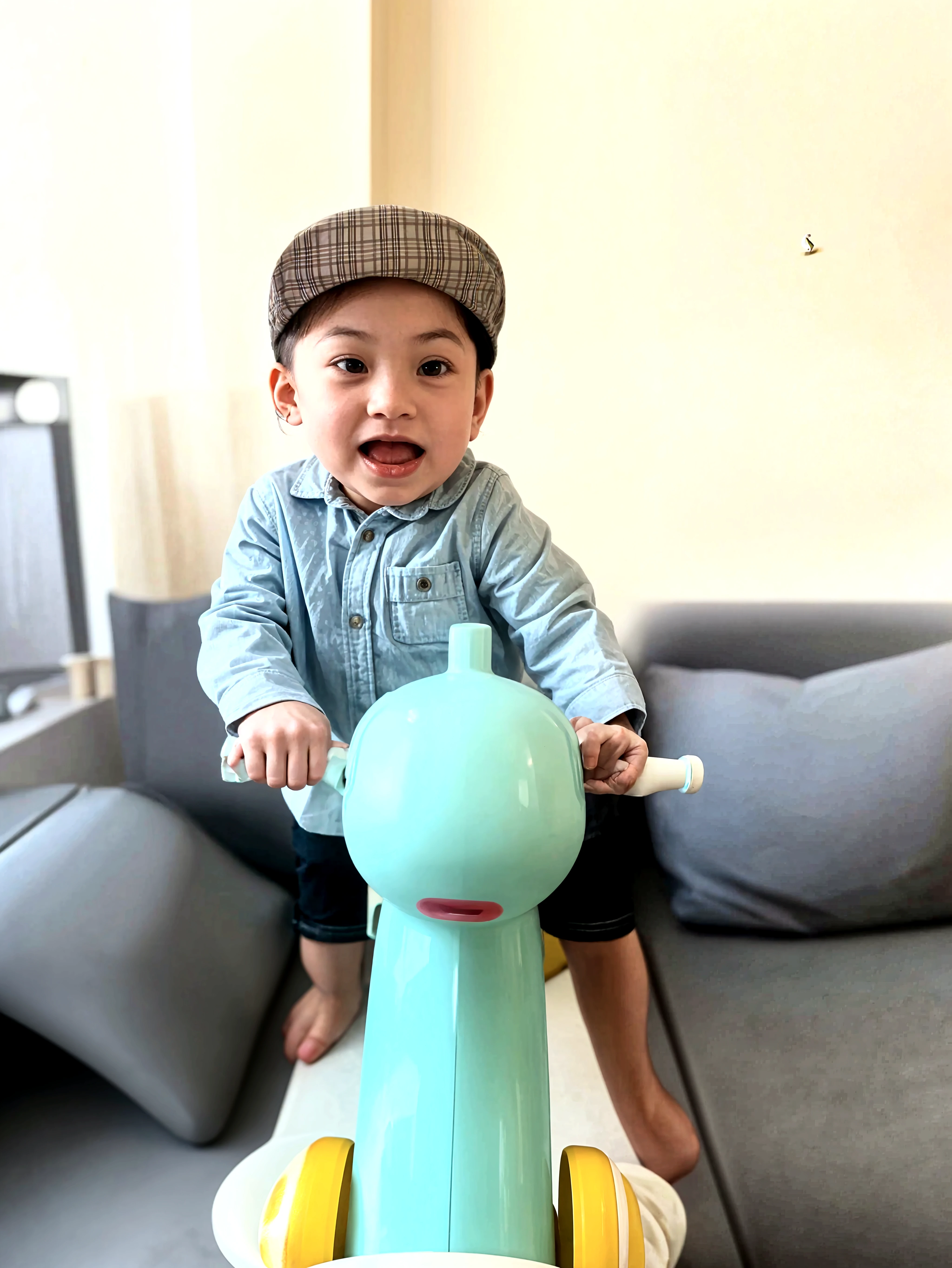 There is a small child sitting on a toy train，Carrot in hand, toddlers, 2 years old, ???, Playing, Playing games, captured with sony a3 camera, in an action pose, shot with iphone 1 0, Working hard, jia, Drive a small toy car, ???? toy, ???? toy, taken with a Sony A7R camera, action  shot