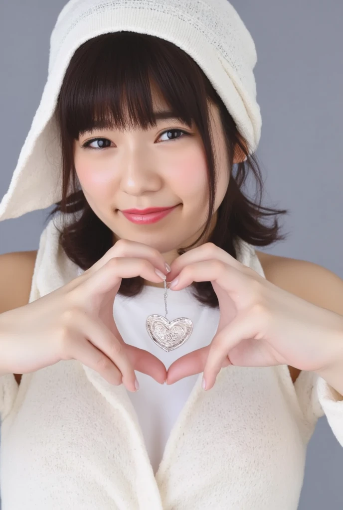 A smiling woman is posing alone wearing off-the-shoulder pajamas, making a firm big heart shape with both hands, and holding them in front of her chest, View above collarbone、The background is a monotone 、
