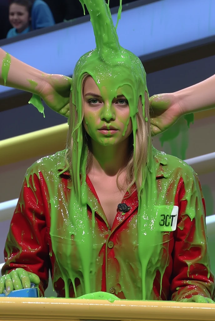 Portrait photograph of Swedish woman covered in green slime. hyper-realistic style. 8k. Photorealistic. Glistening slime. Green slime. Dripping slime. Raw photo. Swedish model. (Swedish girl: 1.1). F/1.4 aperture. 35mm. Red Jacket. Cleavage. Large breasts. Wet. Wavy blonde hair. Gameshow. Stream of green water falling on her head. splashes on her head. Splashing.