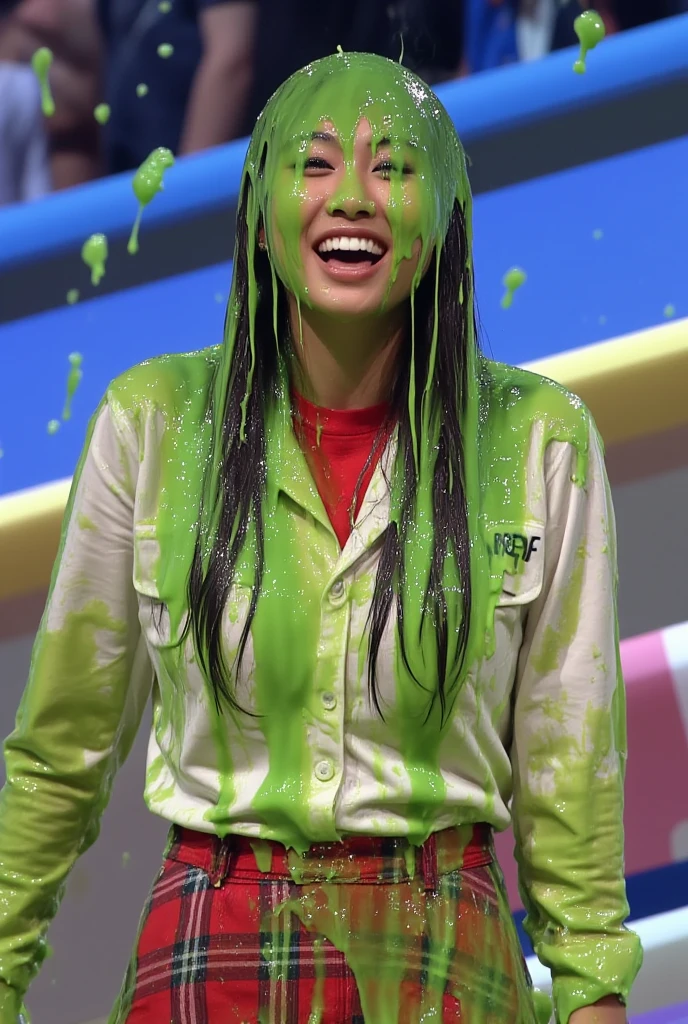 Action photograph of Asian woman covered in green water. Photorealistic. Glistening liquid. Green slime. Raw photo. Asian model. (Asian girl: 1.1). F/1.4 aperture. 35mm. White button shirt with cleavage. Red plaid skirt.  Cleavage. Wet. Black hair. Gameshow. water splashes on her head. Stream of falling water.