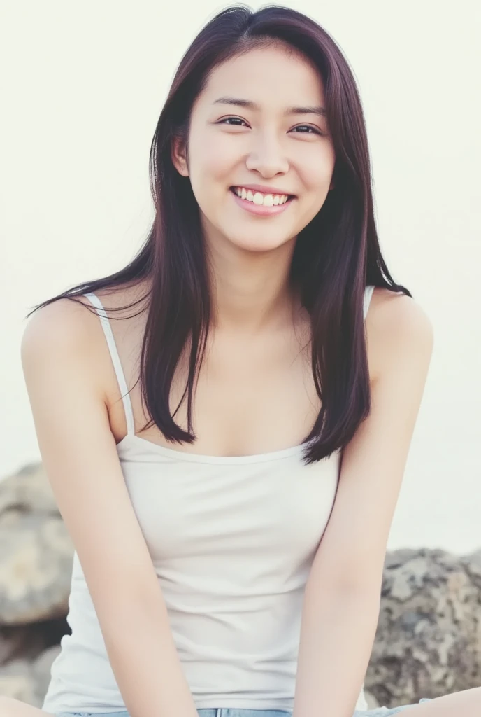 A smiling woman is posing cross-legged alone wearing a camisole where the inside of the thin fabric can be seen through and her nakedness can be seen through, View above collarbone、The background is a monotone 、
