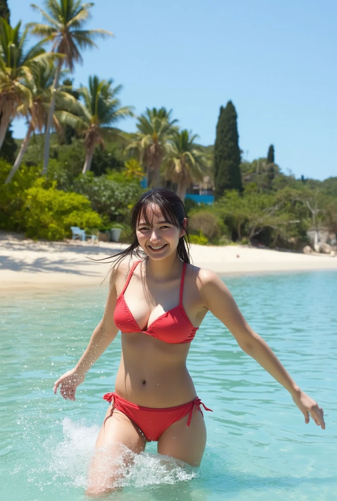 Woman wearing a swimsuit playing in the sea