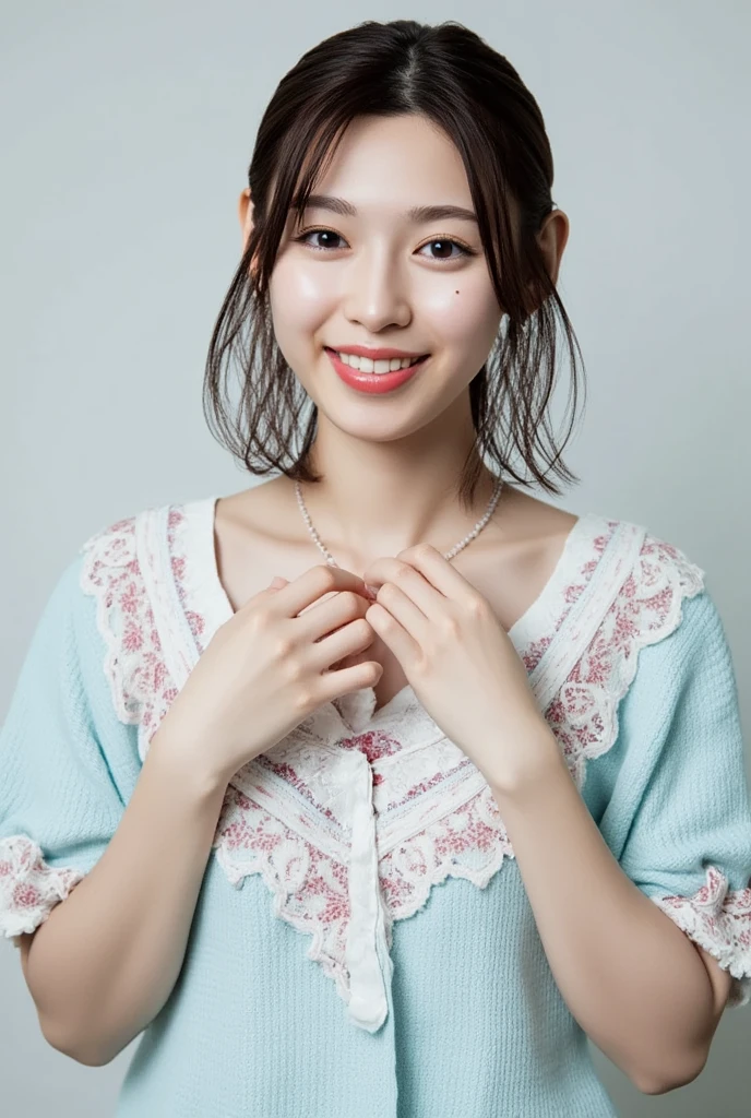 A smiling woman poses alone wearing off-the-shoulder pajamas in pastel colors that convey warmth simply by touching them softly and softly, making a firm, large heart shape with both hands, and holding them in front of her chest, View above collarbone、 background is monotone、
