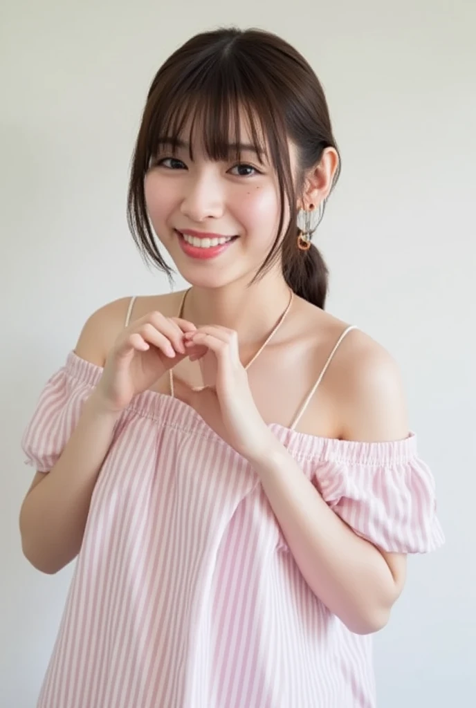 A smiling woman poses alone wearing off-the-shoulder pajamas in pastel colors that convey warmth simply by touching them softly and softly, making a firm, large heart shape with both hands, and holding them in front of her chest, View above collarbone、 background is monotone、
