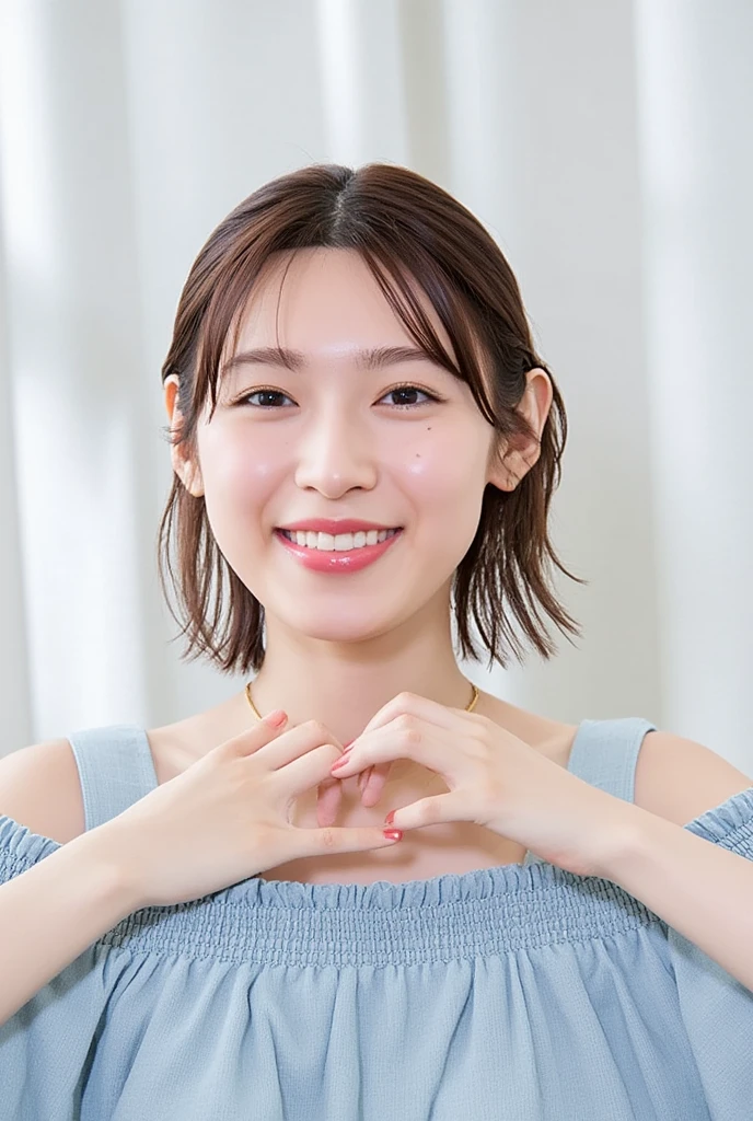 A smiling woman poses alone wearing off-the-shoulder pajamas in pastel colors that convey warmth simply by touching them softly and softly, making a firm, large heart shape with both hands, and holding them in front of her chest, View above collarbone、 background is monotone、
