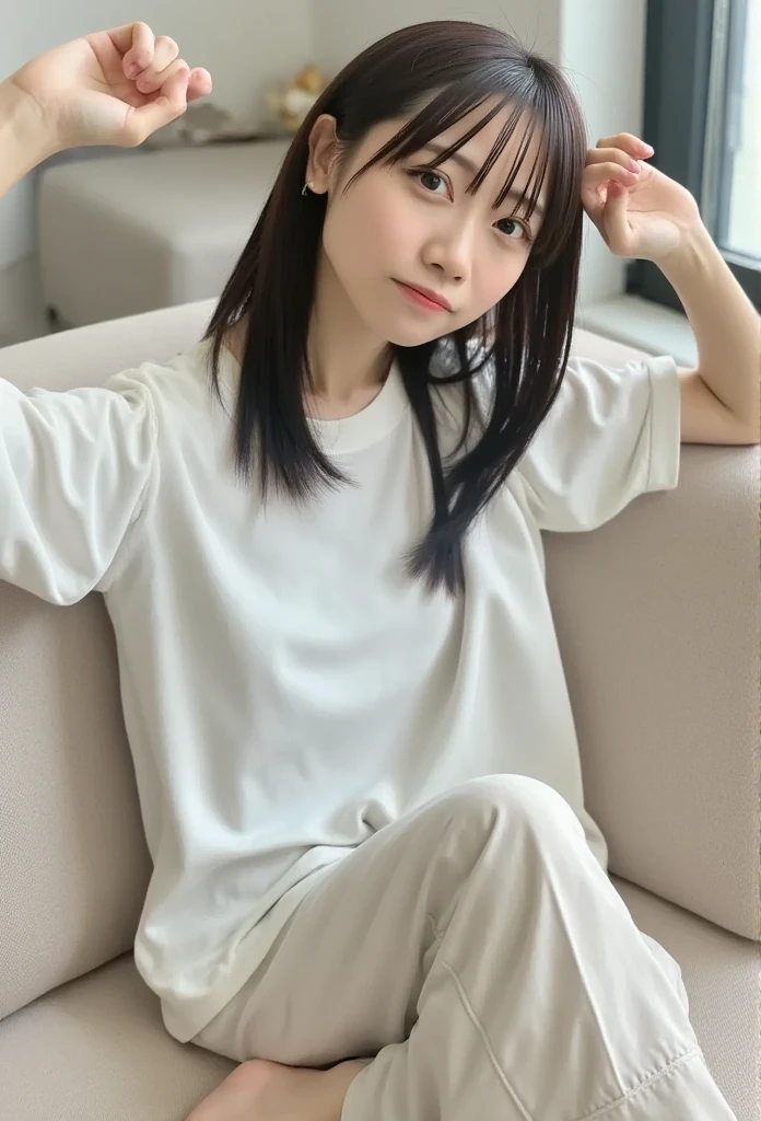  close-up portrait , slender East Asian woman with bangs ,  bright and pure colors stand out 、 I'm wearing a striking white oversized t-shirt.  relax on the beige sofa 、 sitting in a playful pose Yes , Legs crossed slightly 、 is barefoot on the couch .  Her expression is soft and natural ,  creates a comfortable and calm atmosphere .  The composition is straight ahead ,  captures everything from the upper body to the feet . In the background、Natural light pours in through the window、 there is a softly lit room ,  emphasizes a quiet, minimal tone ,  the brightness of the white shirt catches my eye 