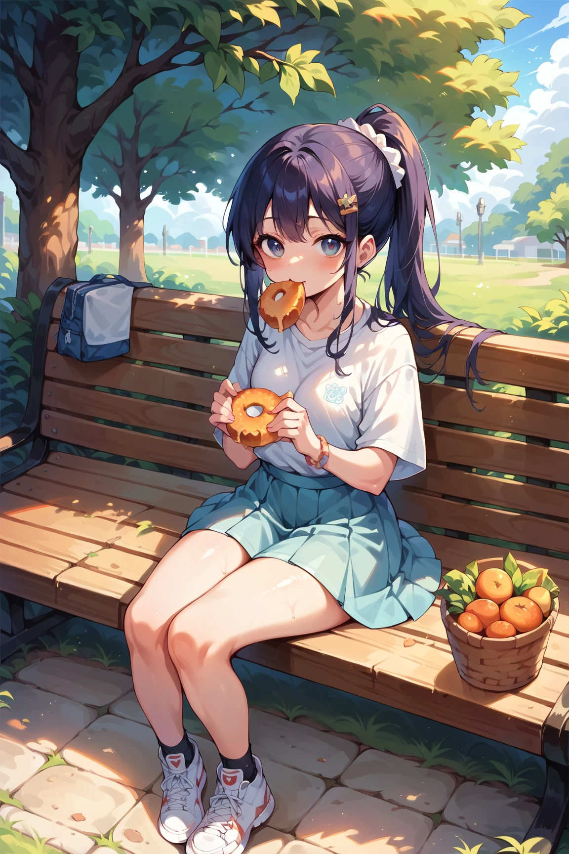 Female student eating lunch while sitting on a bench in the park