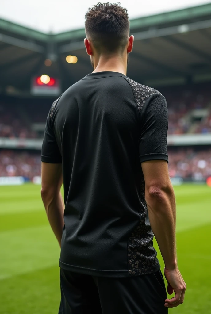 Design a men's football jersey, Black jersey with short sleeves and V-necks, that the fabric at the end of the sleeve is red. From behind 