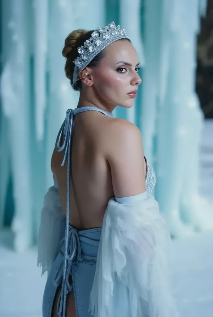 dafnekeen, play of shadow and light, A close-up cinematic shot of a female character dressed in an elaborate ice-themed costume against a frozen backdrop. The scene is bathed in cool tones of blue and white, creating an icy atmosphere. She wears a round headdress encrusted with glittering embellishments.  Her expression is serene and contemplative, with her eyes slightly closed and her head tilted back as if looking upward. The background features large vertical ice formations, including icicles and icicle-like structures, which enhance the frozen environment. Soft, diffused lighting creates a gentle glow, highlighting the textures and details of the ice and costume.