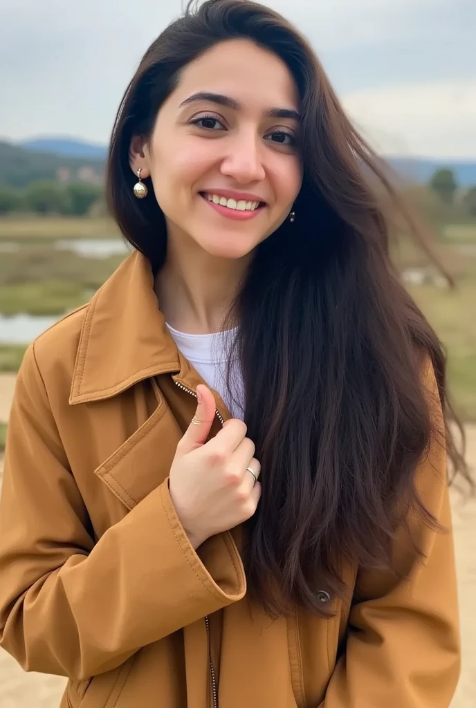 Sahiba, A charming and free-spirited young woman who embraces her natural beauty and loves the great outdoors. dark hair, smile, formal wear, jacket,