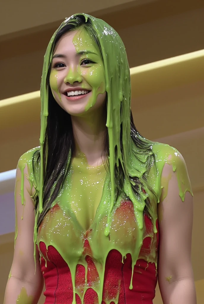 Armateur photograph of Asian woman covered in green slime. Photorealistic. Armateur photography. Glistening liquid. Green slime. Slime. Dripping green goo. Raw photo. Wearing red lace bra. Cleavage. Gameshow. Custard. Slight over exposure. Flash photography. Detailed skin. Black hair. Asian girl.