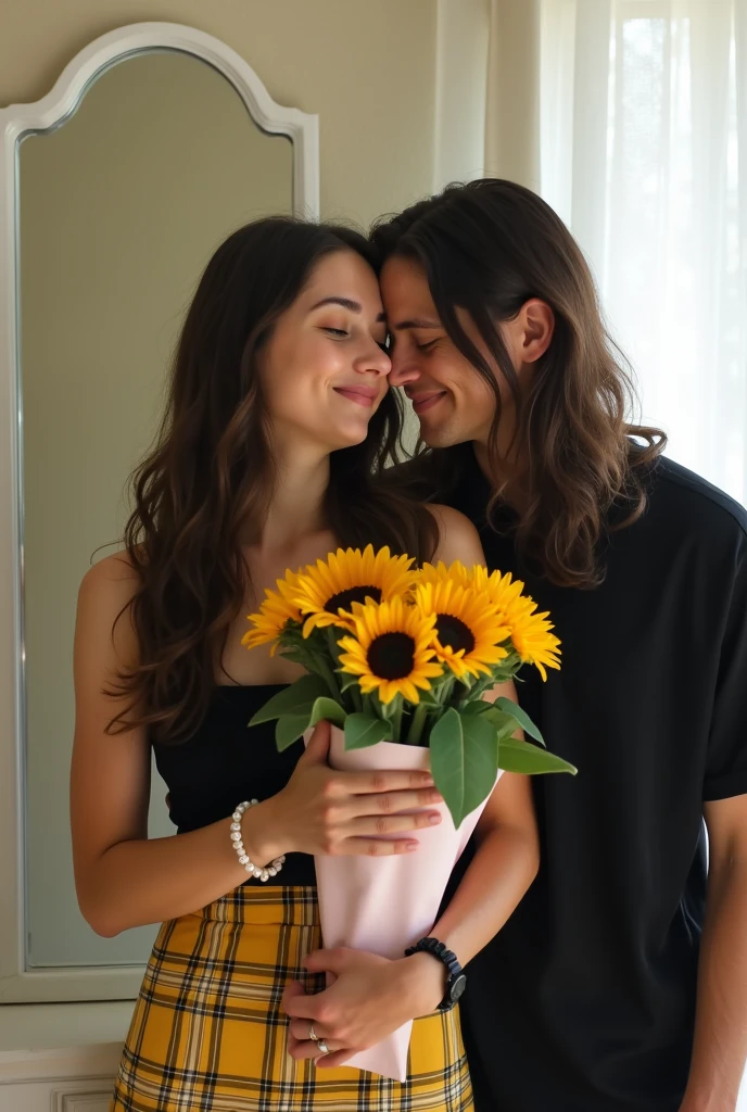 A young couple in love in a field of red flowers, The boy has long black hair and the girl has brown curly hair.