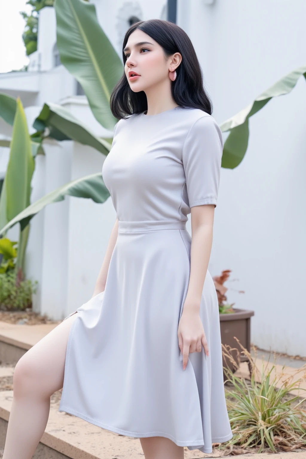 An elegant girl (clothing color soft light gray) wearing a minimalist style dress with a light gray overall color, a round neckline that fits the neck without revealing too much skin, elegant and neat. Sleeve type short sleeved, 5-8 centimeters below the shoulder, loose and moderate, relaxed and casual. The skirt is tailored with a light waist and an A-line hem, reaching up to the knee for a natural and smooth look, reflecting the curve of the waist without exaggeration. The fabric selection is matte silk, with a soft texture. The details of the dress are decorated with intricate stitching in the same color scheme, especially at the waist and cuffs, adding a sense of layering while maintaining simplicity. Presenting a soft matte texture, non reflective but with subtle layering. (Natural black hair) Hair is natural black with a slight luster, and long hair is smooth and flowing, simple and refreshing. • Head posture: Slightly tilt the head to the left, expose the right ear, and display the earring. Hand movements: Gently approach the neck with the right hand, bend the fingers naturally, and relax. Place the index finger slightly close to the ear, indirectly guiding the gaze to the earrings and finger accessories. • Eye direction: Head up to the camera, showing a confident and gentle expression. Shoulder posture: The shoulders are slightly tilted back, and the posture is naturally relaxed but with an elegant feeling (Soft natural makeup): Use light brown eye shadow to slightly imp