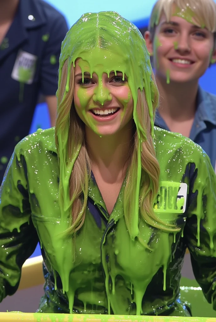 DSLR photograph of woman covered in green sticky liquid. Photorealistic. Glistening liquid. Green slime. Raw photo. F/1.4 aperture. 35mm. wearing jacket. (Cleavage: 1.1). Blonde hair. Gameshow. Portrait photograph. Slime. Wearing winged eyeliner. Wearing long fake eyelashes. water drop. motion blur. splashing.