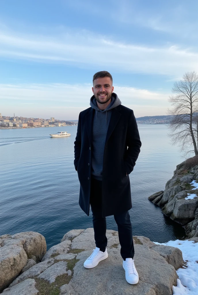 A young man have a light skin tone and a subtle, natural smile that suggests he is enjoying the moment, stands on a rugged cliff overlooking a tranquil bay in Stockholm, Sweden. The scene captures a crisp winter morning with icy blue skies streaked by soft, wispy clouds. The man wears a long black coat with neatly buttoned lapels and white sneakers. His vintage grey hoodie on his head is a deep grey colour, with a soft and casual fabric that appears cosy and well-fitted. The hood is pulled up over his head, framing his face gently and slightly overlapping the lapels of his long black coat. The distant cityscape across the bay glimmers with sunlight, showcasing a harmonious mix of modern towers and classic Nordic architecture. A solitary boat glides smoothly across the water, leaving a delicate wake. Bare, leafless trees and patches of moss on the rocky outcrop add an organic texture, enhancing the serene, introspective mood of the moment. (masterpiece), (best quality), (ultra-detailed background), detailed face, perfect composition, intricate details