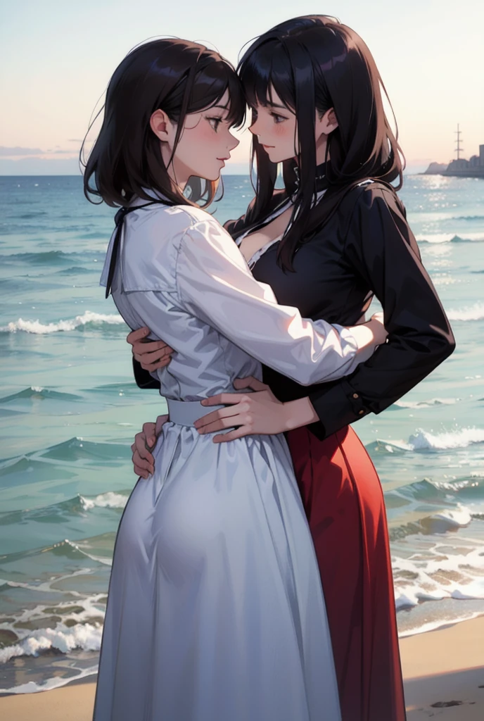 Two women are hugging each other; one is facing outward, while the other is embracing her from behind. The background is a seaside setting.