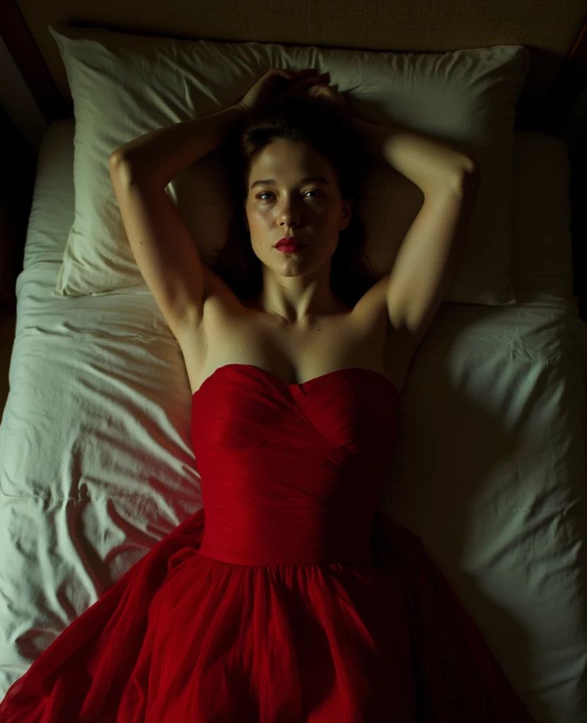 Lea Seydoux, picture from above, lying limp on a bed on back, red strapless dress , drunk face, arms up