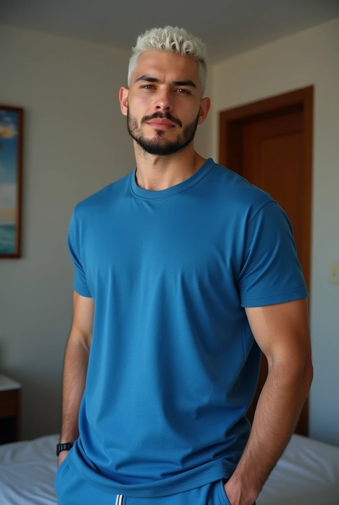 create the image of a 21-year-old man , Thëëo Jamës , high, strong body, Shaved curly hair painted snow white, short beard cropped on the side , square face , fair skin , strong and muscular , dynamic pose style, Relaxed, wearing sweatpants Cinca , camiseta azul oversized, in the background of a minimalist hotel room in Chile, Natal, winter.