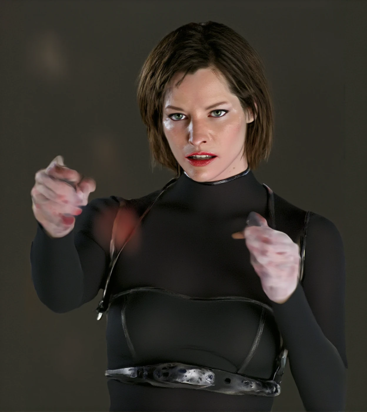 two women fighting, one is Alice and the other is Jill Valentine(Sienna Guillory).