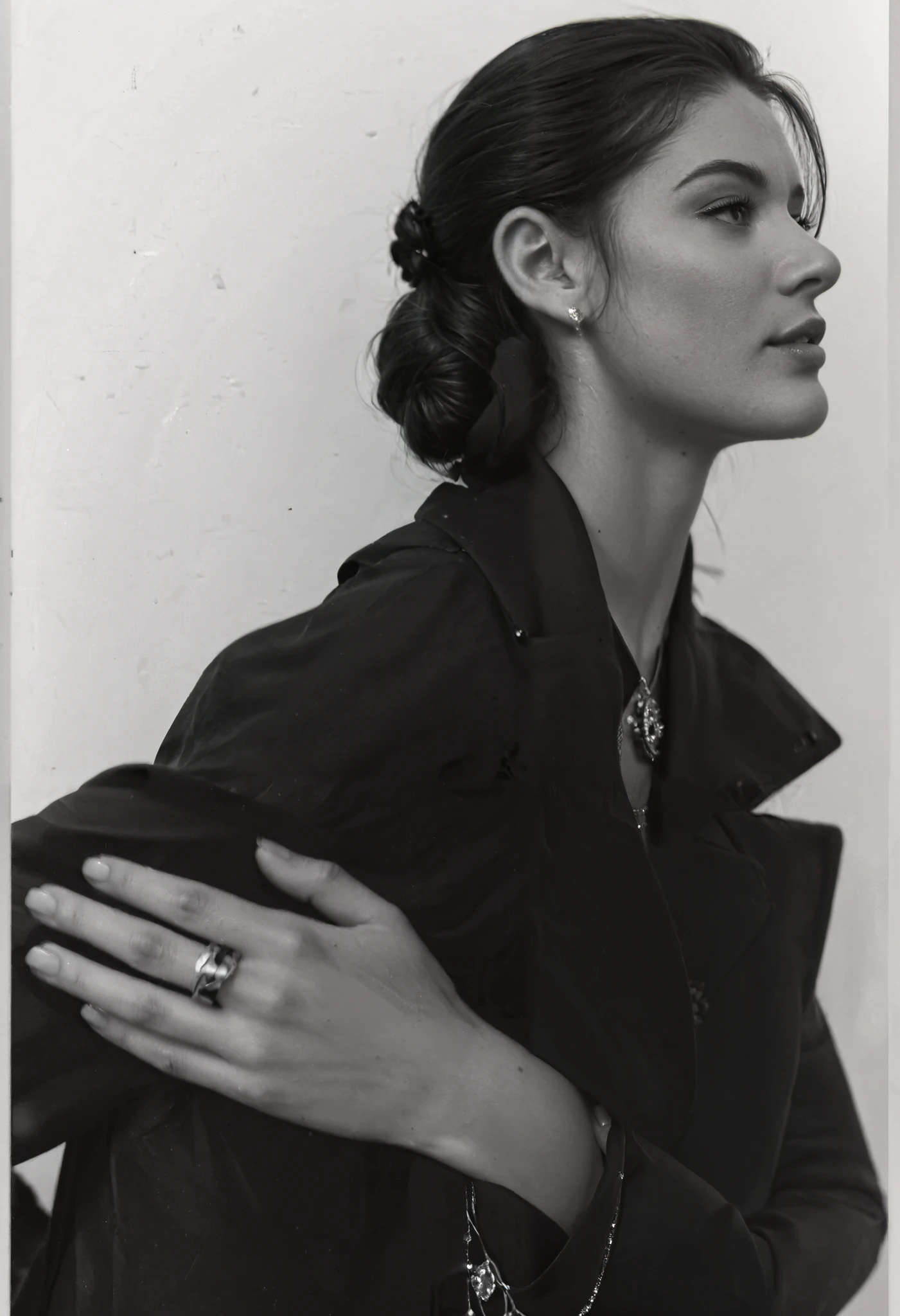 True profile - side view face, a black and white photo of a woman with a ring on her finger, stylish coat with necklace, (beautiful tied hair in up-do hairstyle:1.2), photo of a hand jewellery model, julia sarda, by Nina Hamnett, by Emma Andijewska, official jil sander editorial, by Christen Dalsgaard, official dior editorial, lena oxton, by Silvia Pelissero, by Anna Haifisch, christina kritkou, masterpiece, best quality, 