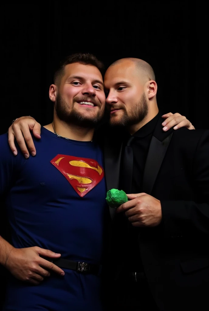 Portrait-style image featuring two men against a dark background. The man on the left has his back leaning on other man, he looks like Nick Bosa dressed in a Superman costume, characterized by a blue suit with a large red and yellow 'S' emblem on the chest. He has short, dark hair, short dark beard, light skin, grimacing in pain facial expression, suffering, pain, hurt, agony, almost unconscious. The man on the right is bald, has light skin, and is wearing a black suit with a black shirt and tie. He has a serious expression and is holding  a green rock that emits a faint glow. The overall composition suggests a dynamic interaction between the two characters.They kiss a lot.gay kiss