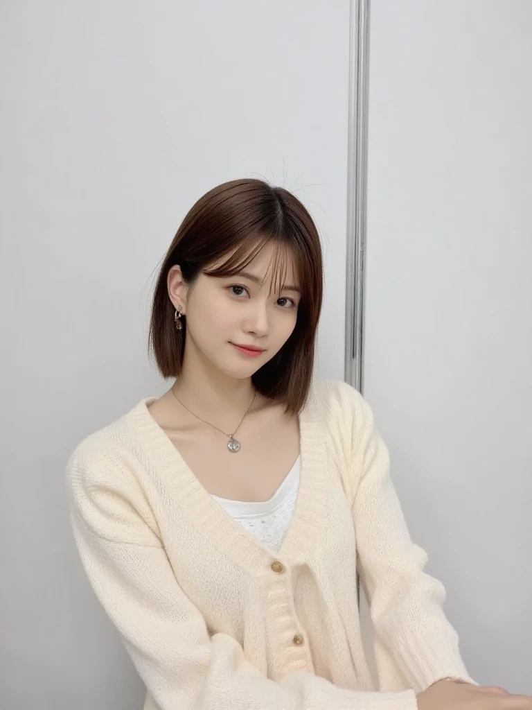 (( top quality , 8k, masterpiece :1.3)),  1 girl, ( bob hair、 short hair, Taken in front of a white wall  :1.2)、（  gentle smile), Shot in natural light、 pastel colored cardigan :1.1, Angle from above、super  detailed face ,  beautiful eyes,( Extremely Realistic Photos ,  high res,  detailed face ,  beautiful eyes)、 Japanese woman, 3, Various expressions, Alone:1, Various hairstyles,  casual clothes,  There is only one person in the photo、 long sleeve dress、柔らかな Shot in natural lightされました、 simple necklace 、Spring clothes、 camera、 profile 、 dark brown hair color