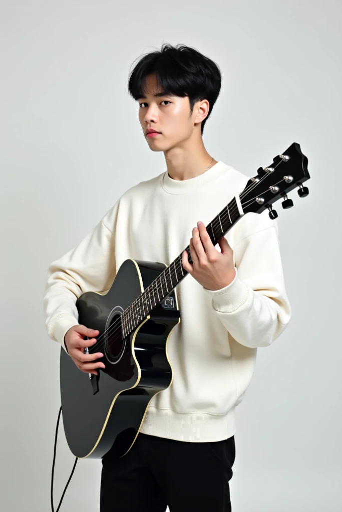 Medium size white male with short black hair wearing black guitar with white sweater and black pants