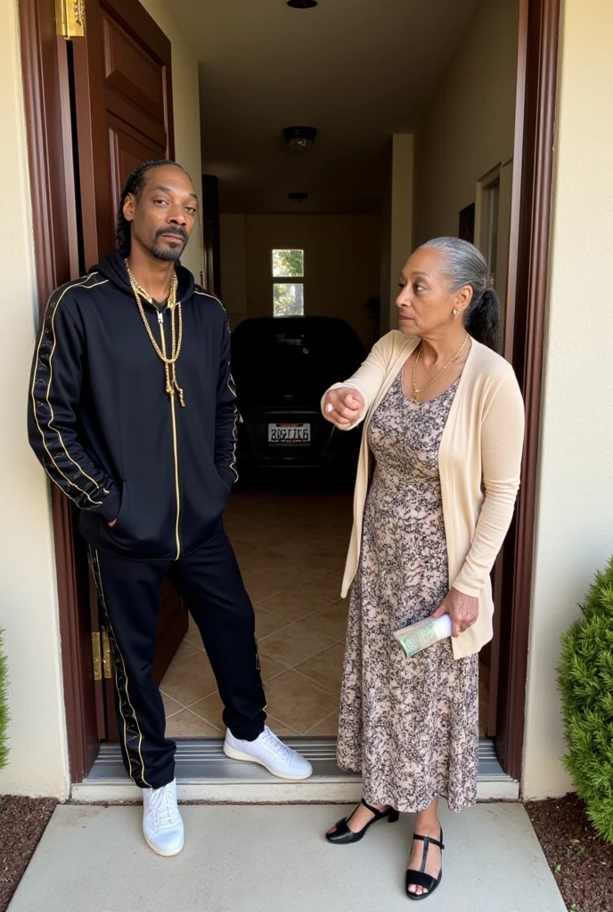 An ultra-realistic image of Snoop Dogg standing in the doorway of his stylish California home, casually leaning against the doorframe with a slight smirk. He is dressed in a sleek black tracksuit with gold accents and white sneakers, his signature braided hairstyle glinting under the afternoon sun. Opposite him, Mrs. Johnson, a small but fiery elderly woman, stands with a furious expression, her face slightly flushed with anger. She is wearing a floral dress, a beige cardigan, and low-heeled shoes, pointing an accusatory finger directly at Snoop while clutching a rolled-up newspaper in her other hand. Her stance is firm and confrontational, her mouth mid-sentence as if scolding him loudly. The background shows a suburban neighborhood with neatly trimmed lawns, a parked car in the driveway, and a faint glimpse of neighbors peeking out from their windows, adding to the charged and humorous tension of the scene