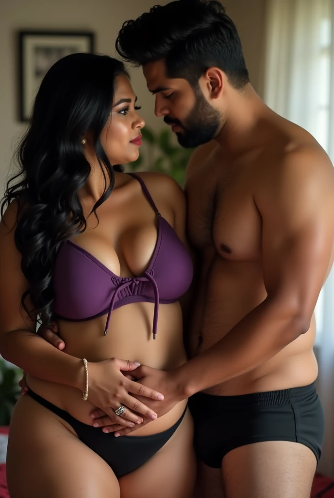A beautiful gorgeous plump Indian 55-year-old woman wearing a dark blue thin bra panty, long hair, huge breasts, hot body curves, smiley face, white skin, laying on bed with 21 years old handsome man doing romance in room male and female face 