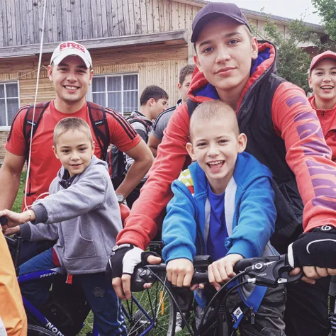 a white blond haired girl kneeling down to look at a boy who is the size of the bug a beetle, the boy’s expression looking at the girl is immense fear while the girls is curiosity, the boy is in a position of siting on the ground with his arms back, the girl is kneeling squating with her hand on her chin in a poster of curiosity. the girl looks like a tower from the boys POV.