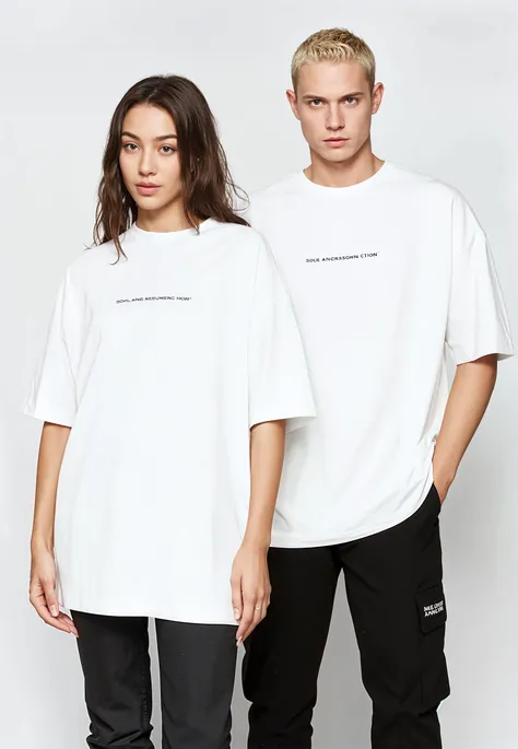 heterosexual couple of 12-year-old teenage lovers holding hands, a boy and a girl, both in white t-shirts, white pants, white sneakers, seen from the front and with black bracelets on their arms holding hands. both the same height and wearing a black t-shirt with tanned skin and a black bracelet on the same arm where they are holding hands. The couple's arms should be close. the photo must show both of them in full body. Both of their clothes must be completely white.