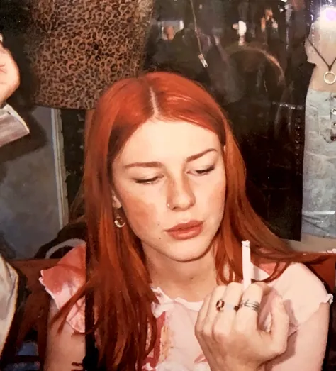 A teen girl getting fucked from the back, doggy style, penis in pussy, rapidly smoking cigarettes, sucking very hard on the cigarette, teenager, lots of cigarette ash, very long cigarette ash, small breasts, red hair, pigtails, freckles, at a party, leggings, disgusting slut