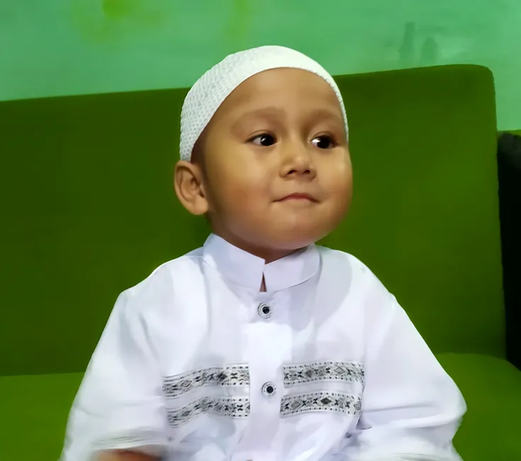 there is a young boy wearing a black hat and a blue shirt, reyyan, 2 years old, taken with sony alpha 9, 4yr old, riyahd cassiem, close up potrait, 5 years old, from 8 k matte, potrait, ayan nag, ismail, captured on canon eos r 6, old picture