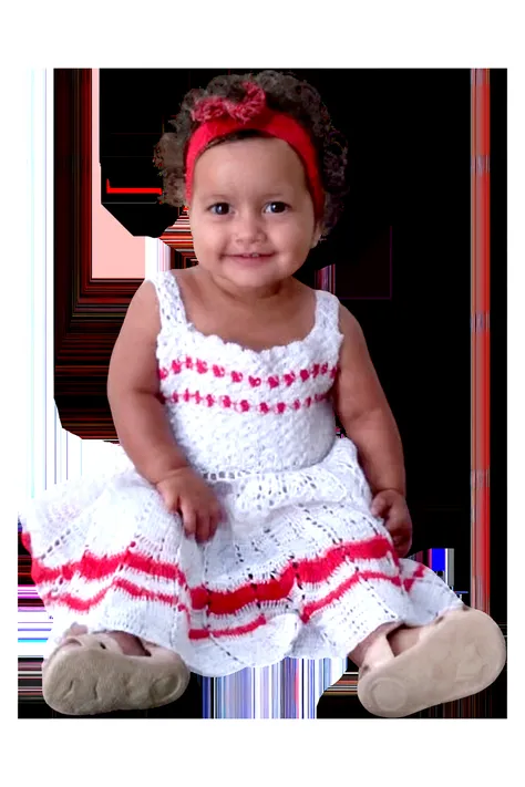 Beautiful peruvian small girl with wavy long hair, cute dress, lifting her skirt up
showing her underwear