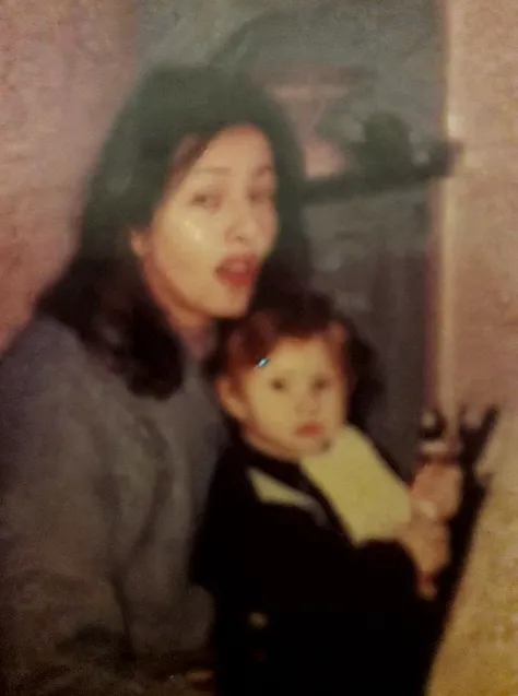 A black-haired mother with her little boy, real, 4k, masterpiece