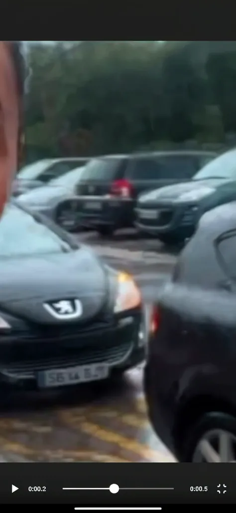 Beautiful 20 year old woman, long red hair, green eyes, enormous tits, hyperrealistic, (cum on face tits and ass:1.2), on knees begging Police Office who is writing a ticket next to a parked car. uhd, 8k