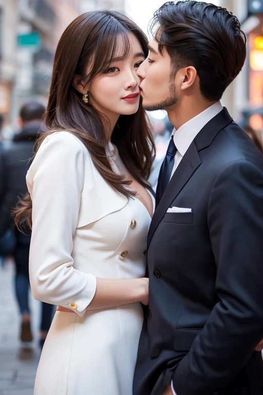 예쁜 여자친구의 얼굴에 입을 맞추는 잘생기고 키가 큰 남자