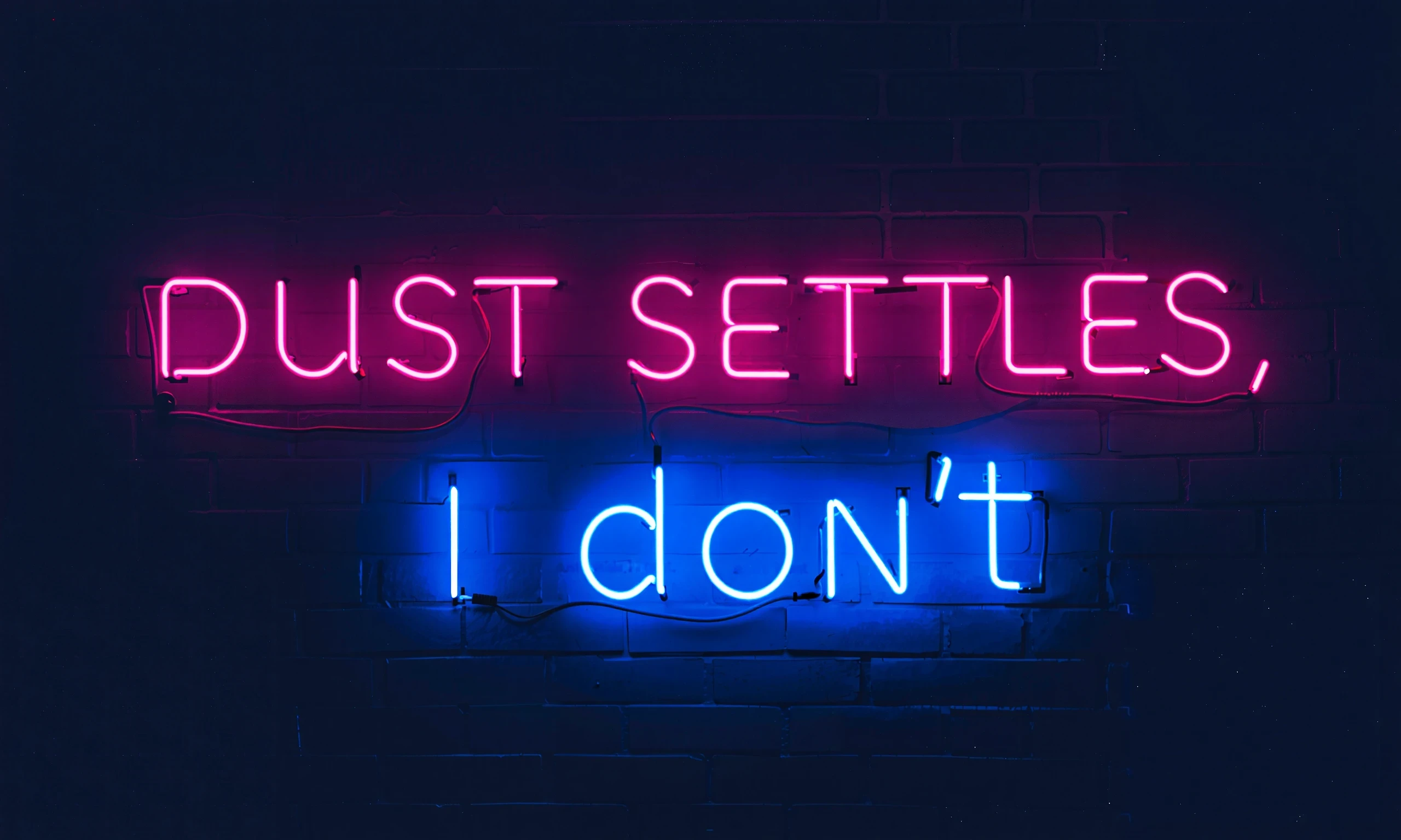 Simple slogan text rendered as a neon sign on a wall, can handle up to 10 words, longer words require more rendering attempts.<br>Please enter the neon sign words that you want inside the quotes