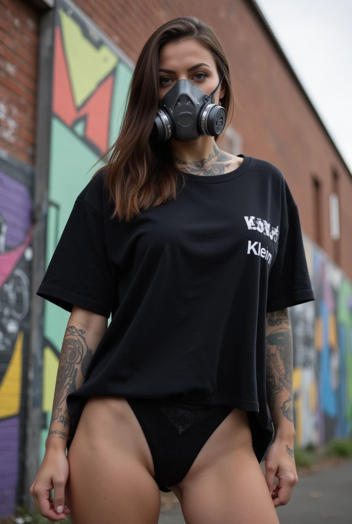 Sexy girl with long black hair in black shirt and black joggers taking a selfie, with black mask