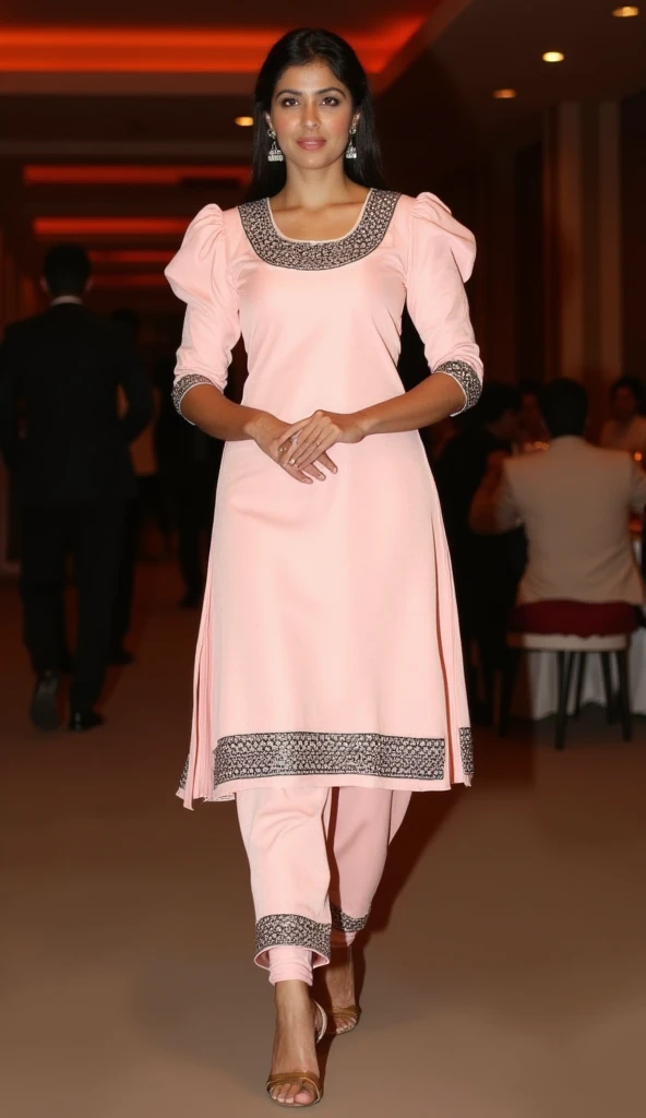 a tall fat v shape body figure woman stands straight gracefully at a party,camera-facing with her hands  together in front of her.she is wearing a punjabi-style outfit made of pale pink satin black stone,motifs design work fabric kurti. the round-neck kurti has exaggerated puffy shoulders, adding a dramatic flair, and fitting 3/4 sleeves for an elegant touch. paired with satin fabric dhoti-style shalwar,the look is completed with high heels that accentuate her poised stance,exuding sophistication and allure.