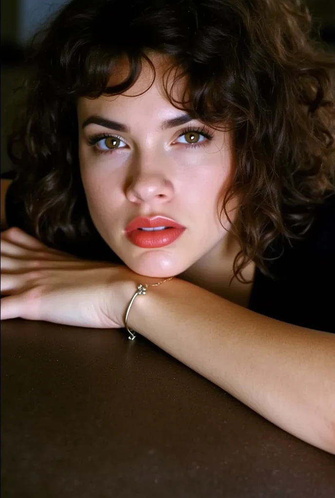 A photorealistic and cinematic image of young teri resting her head on her clasped hands, looking at the camera. She is dressed in a black top and wears a delicate bracelet on her left wrist. The background is dark and blurred, enhancing the focus on her gentle expression