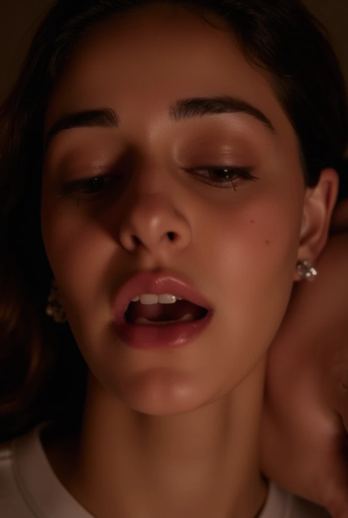 Close-up photo of her face expression while she's having sex