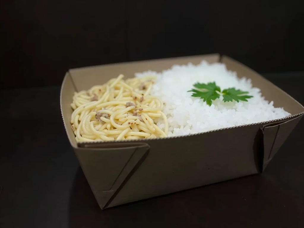 an ultra realistic image of a delicious stroganoff dish served with fluffy white rice with straw potatoes on top served in a cardboard box type packaging, the image creates in the viewer the desire to taste it