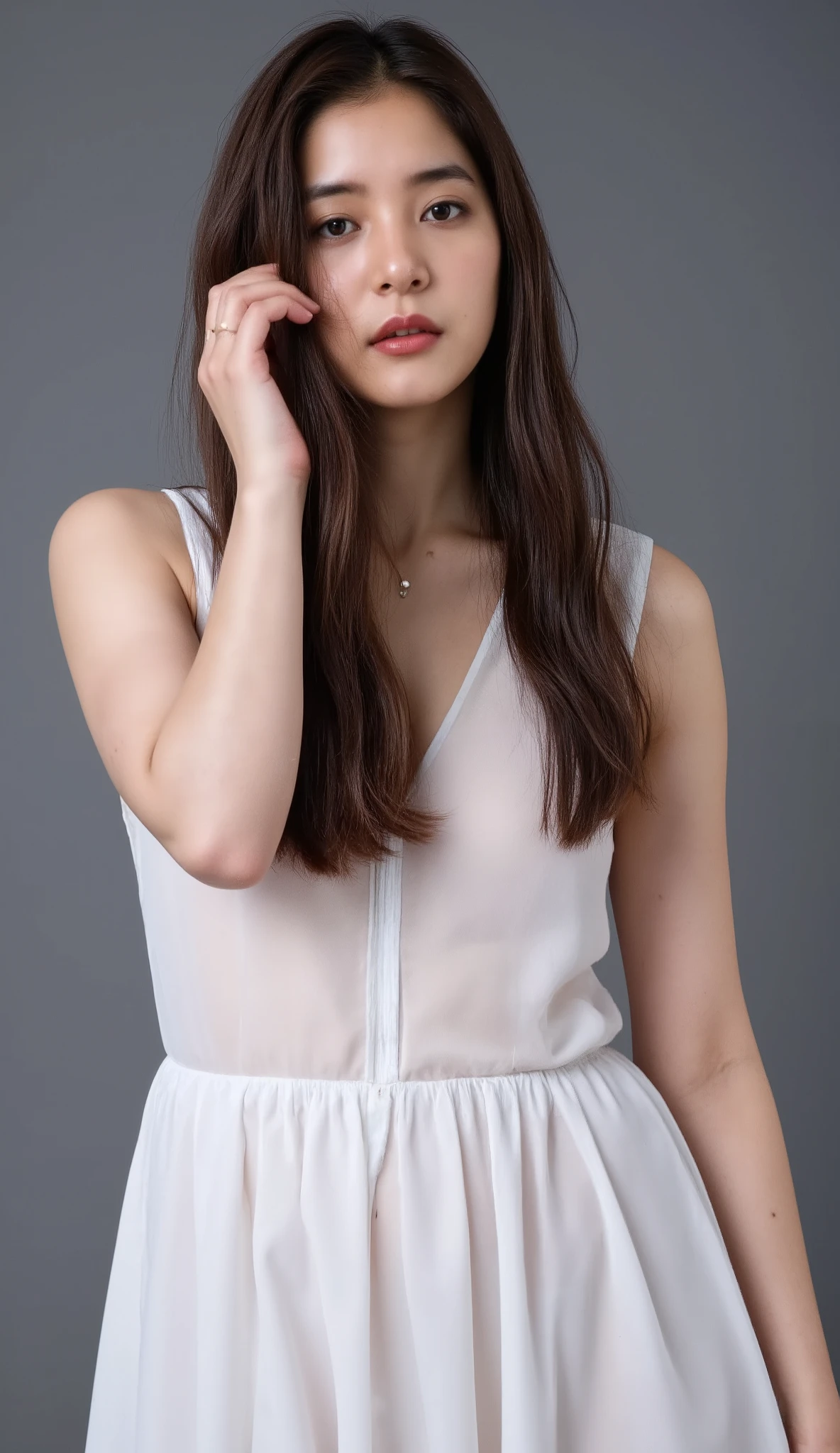 medium full shot of beautiful asian girl with long hair, wearing sleeveless transparent white dress, covered nipples, gray background, studio lighting, necklace, dslr, studio lighting, high quality, film grain, light reflections, blood vessels, pale skin, skin pores,blood vessels in sclera, detailed skin, beauty spots, skin fuzz,.