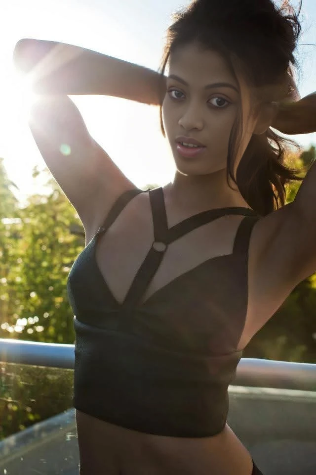 (short_dreads_hairstyle:1.3),woman posing for a photo, wearing elegant, black dress,
good hand,4k, high-res, masterpiece, best quality, head:1.3,((Hasselblad photography)), finely detailed skin, sharp focus, (cinematic lighting), night, soft lighting, dynamic angle, [:(detailed face:1.2):0.2],(((futuristic city))),       <lora:short_dreads_hairstyle:0.5>