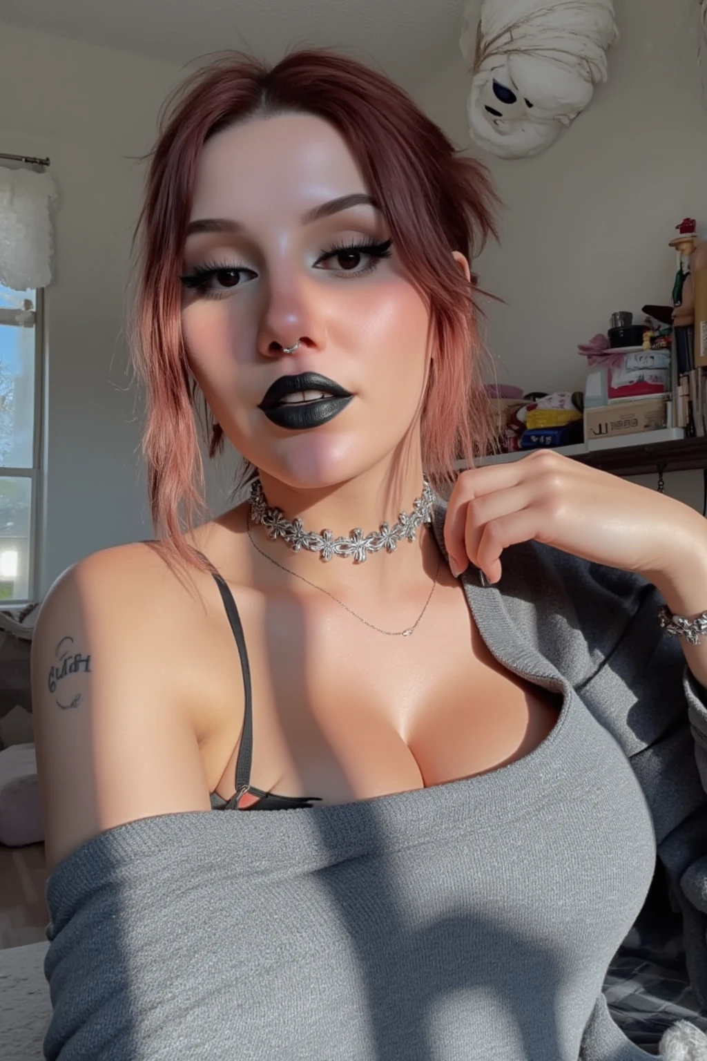Selfie, black top, cleavage, chest tattoo, arm tattoo