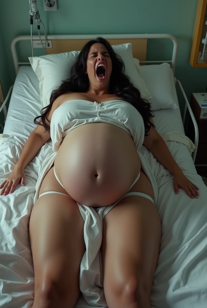 A pregnant woman is seen screaming in pain while lying on her back with her stomach bulging. The baby's head appearing to come out with mucus on the floor and walls is scary