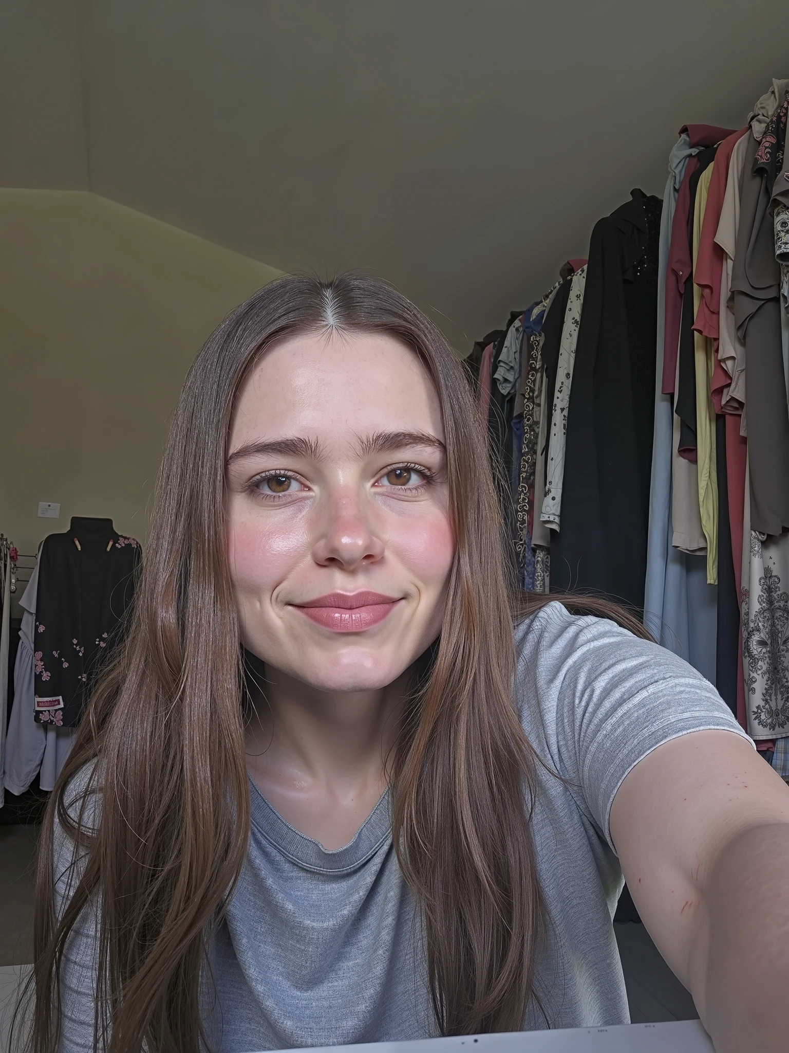 Young light-eyed Caucasian woman holding a camera with her hands, demonstrating a sense of accomplishment and confidence. The woman is sitting on a chair in the modern office radiating positivity and professionalism. With a gentle smile on her face, she exudes a mixture of wisdom and joy. Her Brazilian heritage enriches her features, highlighting her unique beauty. The portrait captures the essence of a mature woman who embodies success and empowerment. The level of detail in the image is astonishing, allowing viewers to appreciate every line, contour and expression of her face. The photorealistic quality elevates the artwork, making it a masterpiece. The lighting emphasizes your features, casting a soft glow on your face, while the colors are bright and vibrant, enhancing the overall composition. The captivating background further complements the subject matter, symbolizing growth and new beginnings. This portrait captures the essence of a mature, Caucasian, grown-up, strong, accomplished woman in a beautifully realistic, high-quality way.