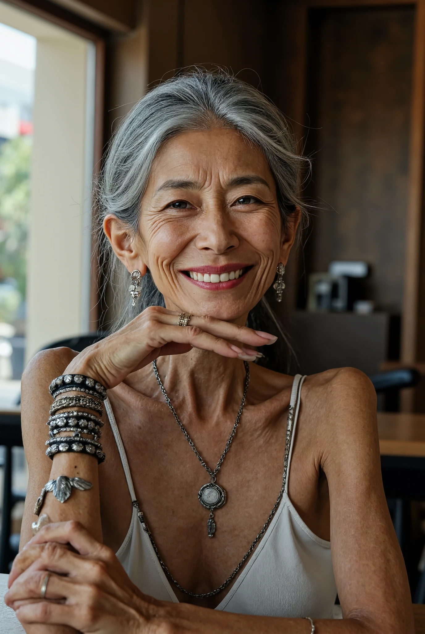 Detail Tweaker LoRA、  photorealistic、 full body image、50-year-old Japanese charismatic old tribal fashion model、 grandma who forcibly makes her younger、Small wrinkles, freckles, and spots on the skin、A dreamy smile、A thin, poor body、super petite body、Irritated skin、 Natural Makeup、Silver damaged and bulky princess cut gray hair、 looking at camera、 I'm sitting and laughing at a country-style coffee shop where bright sunlight shines in、Wedding Rings、A tribal bracelet with lots of silver、Tons of tribal silver accessories、Do your best to create images！You can do it！