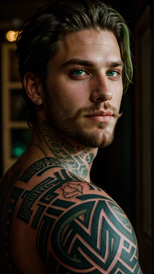 Green eyed tattooed guy smoking 
